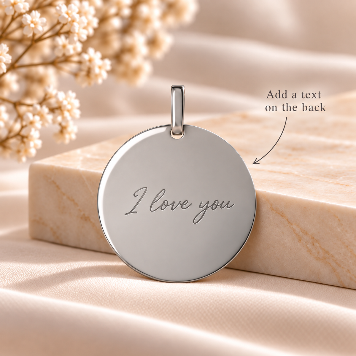 A12 personalised silver round pendant back with text engraving example