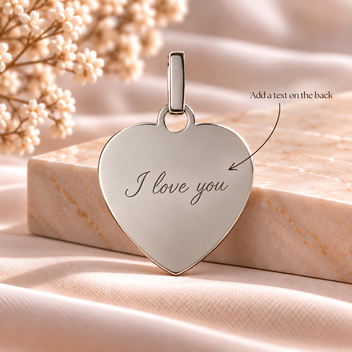 A6 personalised silver heart pendant back with text engraving example