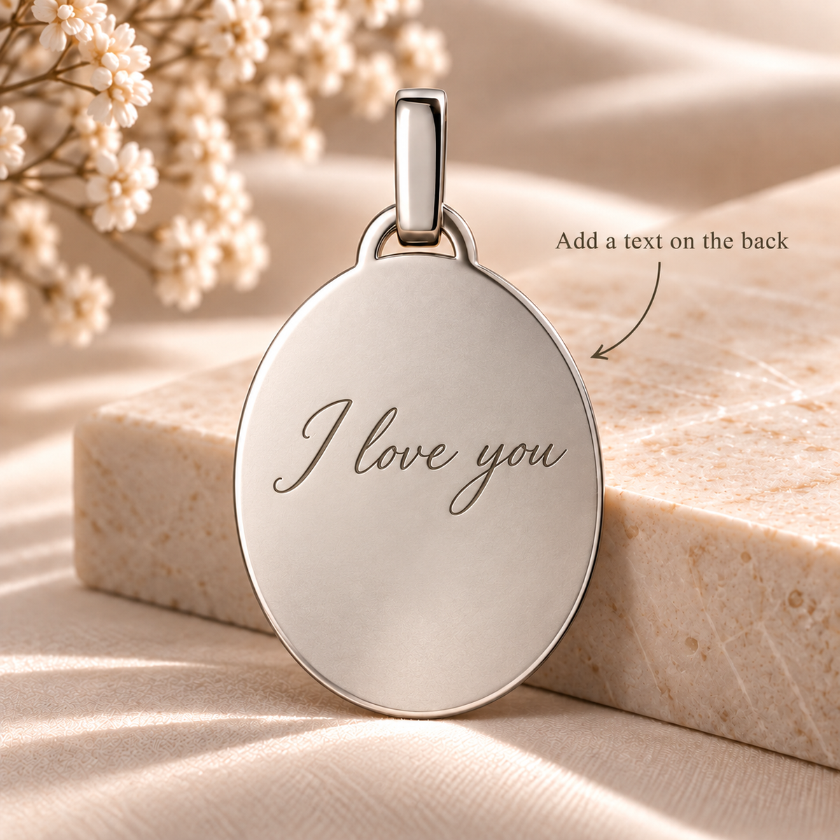 A9 personalised silver oval pendant back with text engraving example